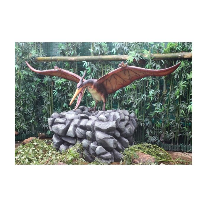Dinosaurier Pteranodon auf Stein lebensgroß Deko- & Werbefigur
