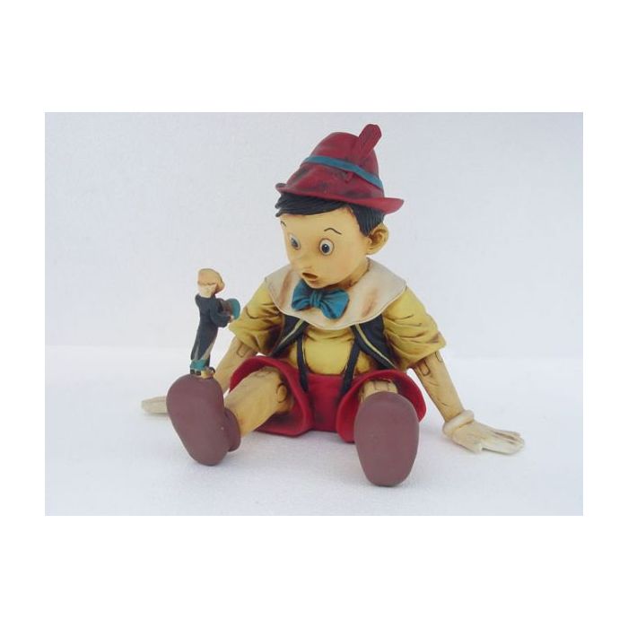 Pinocchio sitzend verkleinert Dekorationsfigur