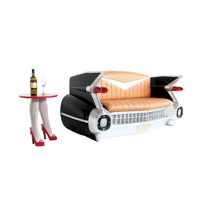 Sofa Cadillac Schwarz mit braunem Polster und Zeitschriften und  lebensgroß Sitzmöglichkeit, Tisch