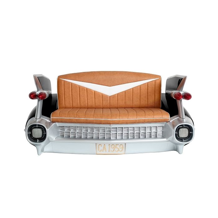 Sofa Cadillac Schwarz mit braunem Polster und Zeitschriften und  lebensgroß Sitzmöglichkeit, Tisch