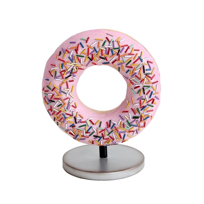 Donut rosa auf kleinem Ständer vergrößert Dekorationsfigur