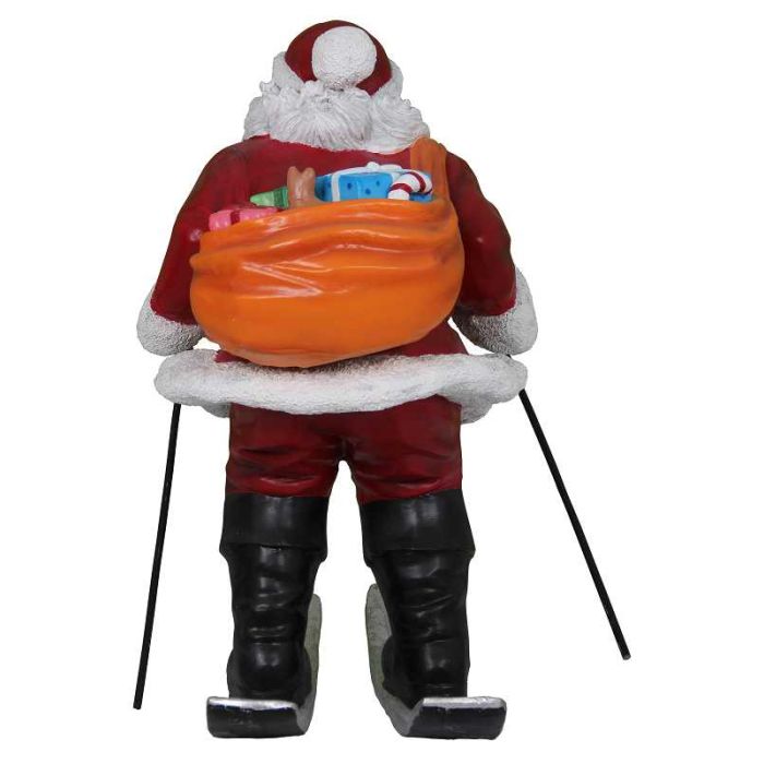Weihnachtsmann fährt Ski lebensgroß