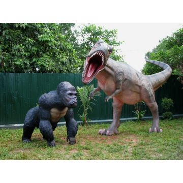 Dinosaurier Tyrannosaurus mit Gorilla lebensgroß