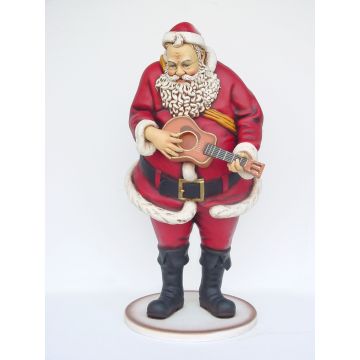 Weihnachtsmann spielt auf Gitarre lebensgroß