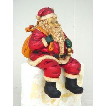 Weihnachtsmann sitzend klein verkleinert