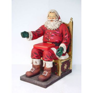 Weihnachtsmann auf Thron mit Kissen lebensgroß