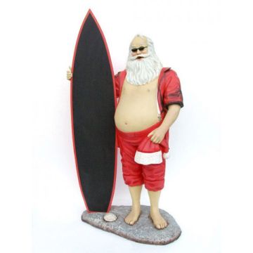 Weihnachtsmann als Surfer mit Angebotstafel lebensgroß