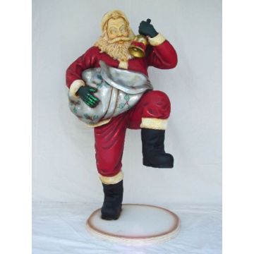Weinachtsmann mit Sack und Glocke lebensgroß