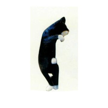 Katze hängend am Zaun klein lebensgroß