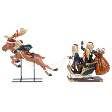 Vier Weihnachtselfen mit Schlitten und Rentier lebensgroß