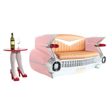 Sofa Cadillac Rosa mit braunem Polster und Zeitschriften und Get lebensgroß