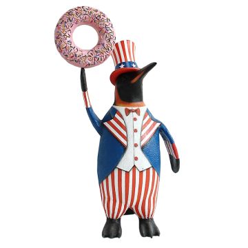 Pinguin amerika mit rosa Donut lebensgroß