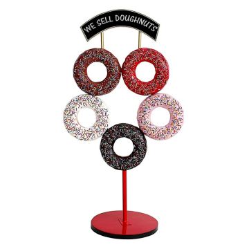 5 Donuts auf Ständer mit Schild vergrößert