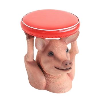 Schweinehocker mit rotem Polster lebensgroß