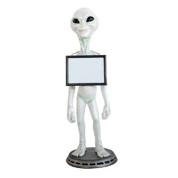 Alien mit Angebotsschild lebensgroß