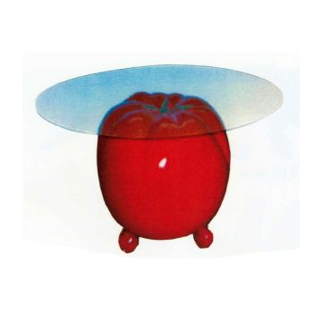 Glastisch mit großer Tomate vergrößert