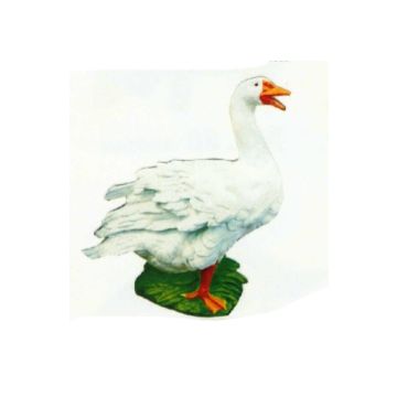 weiße Gans schnatternd auf Wiese lebensgroß
