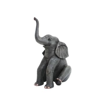 Elefant sitzend mit gehobenem Rüssel lebensgroß