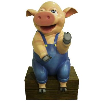 Sitzendes Comic Schwein lebensgroß